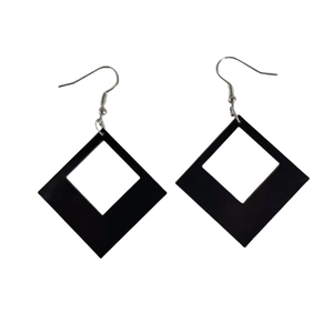 Close-up of black geometric diamond square acrylic earrings with silver metal hooks