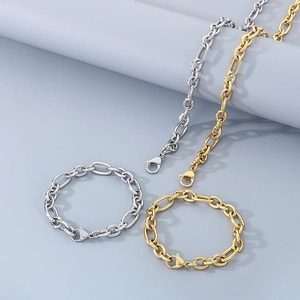 Detailed set of gold and silver stainless steel cable chains and bracelets with lobster clasps