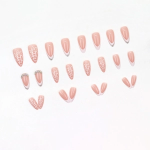 Almond press-on nails with white French tips, hand-painted hearts and silver glitter accents