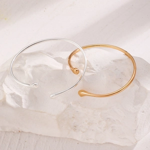Minimalist liquid metal water drop open arm cuffs in polished silver and gold finish