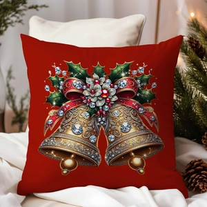 Detail of red Christmas pillowcase with golden bells and holly on a cozy white bed