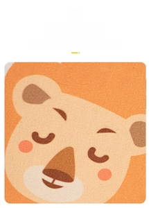Close-up of soft crystal velvet fabric with a cartoon lion pattern for kids' floor mat
