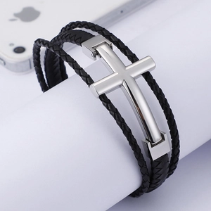 Men's multilayer black woven leather bracelet featuring a polished metal cross charm
