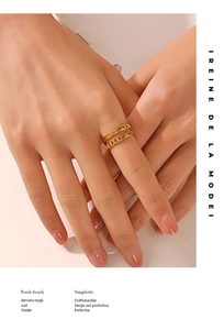 Close-up of minimalist double-layer gold chain ring worn on hand with 18K plating