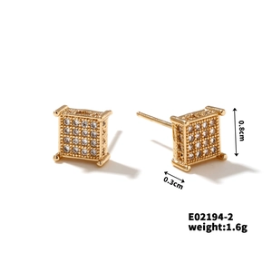 Detailed macro view of gold square stud earrings with zircons and precise dimensions