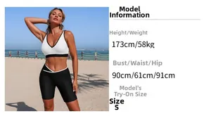 Detailed view of women's sports set featuring a white V-neck vest and black cycling shorts