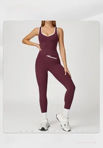 Detail of high-waisted yoga leggings and V-neck top with contrast white line accents