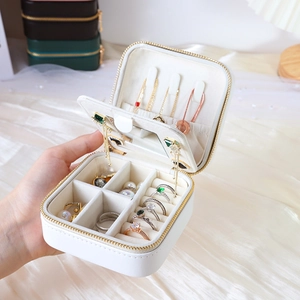 Portable white PU leather travel jewelry box with mirror and ring slots for women