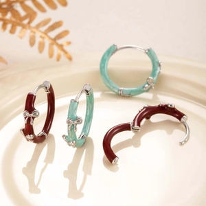 Vintage bow-knot enamel hoop earrings in dark red and mint green finishes