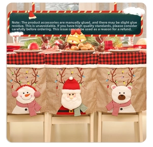 Detail of burlap Christmas chair covers with 3D Santa, Snowman and Reindeer designs