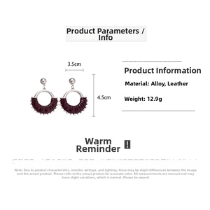 Detailed view of silver hollow round earrings with purple leather wrap and dimensions