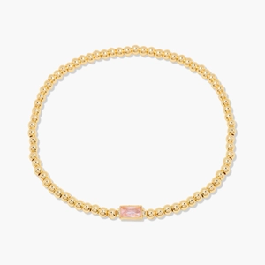 Bracelet extensible à perles dorées avec un accent de pierre précieuse rose rectangulaire