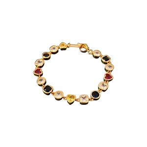 Bracelet vintage doré orné de zircons cubiques multicolores de forme géométrique
