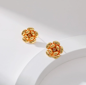 Elegant 18K gold-plated brass flower stud earrings with a minimalist polished metal finish