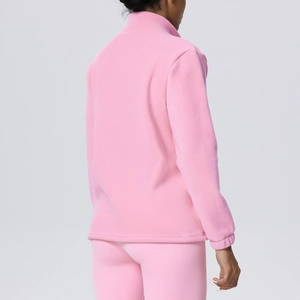 Rear view of pink fleece sports jacket and leggings showing the soft texture and fit