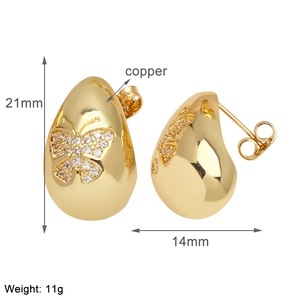 Detail view of teardrop earrings with zircon butterfly, size 21x14mm in gold copper