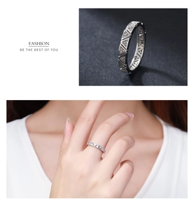 Close-up of S925 sterling silver ring with geometric triangle cubic zirconia stones
