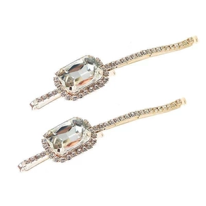 Elegant gold crystal hair clips set with rectangle rhinestones on white background