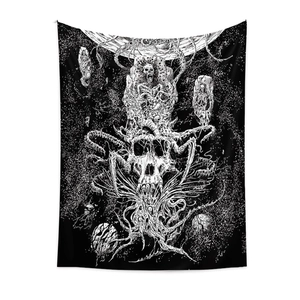 Bohemian black and white skull tapestry with Cthulhu style tentacles on a white wall