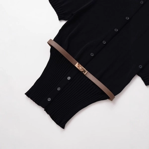 Women's short sleeve knit cardigan with belted waist and metallic buckle closure