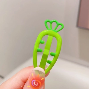 Cute candy-colored carrot hair clip in vibrant green finish for girls and toddlers