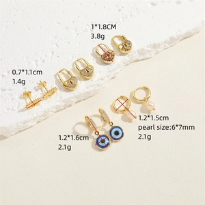 14K gold plated earring set with evil eye, heart locks, zircons, and freshwater pearls