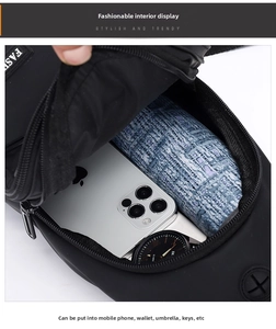 Internal view showing the large capacity of the black waterproof crossbody chest bag