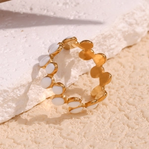 18K gold plated stainless steel ring with white enamel dots on a wavy band