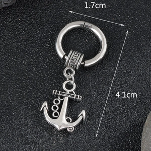 Detail showing dimensions 1.7cm and 4.1cm of a vintage anchor pendant stainless earring