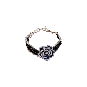 Elegant French camellia crystal bracelet with black beads and sparkling rhinestones
