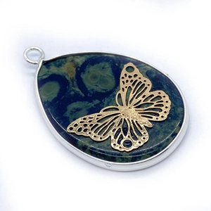 Teardrop pendant with natural stone pattern, gold butterfly inlay and silver metal frame