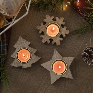 Nordic wooden snowflake and star candle holders for cozy Christmas tabletop decor