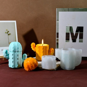Macro view of cactus silicone mold with finished resin storage box and candle