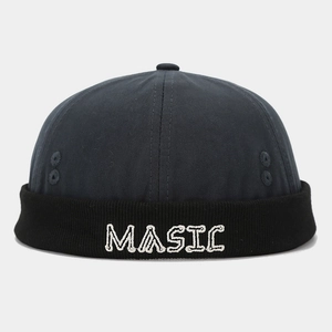 Close-up of MUSIC 3D embroidery on retro color-block cotton miki hat with side eyelets