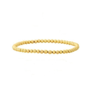 Close-up of minimalist elastic bracelet with polished 18K gold-plated metal beads