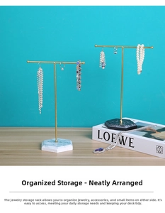 Detail of T-bar jewelry stand with hexagonal marble base for necklaces and earrings