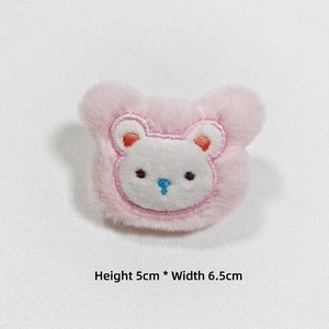 Detail of pink plush bear head showing size dimensions H 5cm x W 6.5cm with embroidery