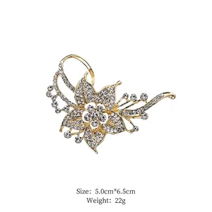 Detail view of flower brooch showing dimensions 5.0cm by 6.5cm and weight 22g