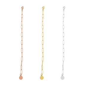Three-color paperclip link bracelets in rose gold, gold, and silver with round tags