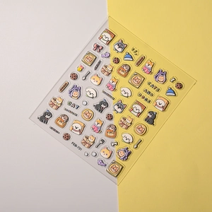 Detail of 3D embossed cartoon cat and dog stickers for DIY nail art and phone cases
