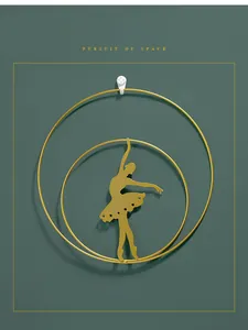 Detailed close-up of golden ballet dancer silhouette inside double metal circles
