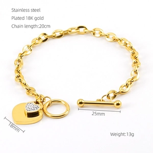 Macro view of 18K gold plated heart bracelet with precise 20cm size measurement markings
