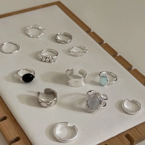 Collection of S925 sterling silver rings with various gemstone inlays and textures