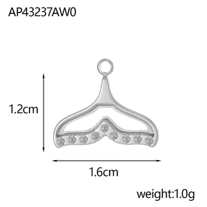 Polished silver whale tail pendant showing dimensions 1.2cm height and 1.6cm width