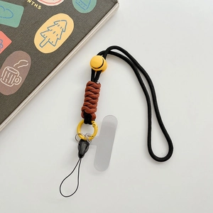 Détail d'un cordon de sport réglable avec paracorde tressée et crochet en métal