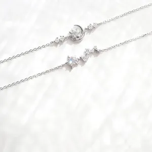 Star and moon silver chain bracelet set with opal stones and sparkling rhinestones