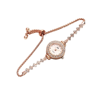 Elegant rose gold women's quartz bracelet watch with sparkling crystal bezel and chain