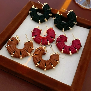 U-shaped woven stripe earrings in dark green, burgundy and caramel colors