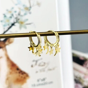 Golden S925 sterling silver hoop earrings with hanging star and moon charms
