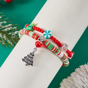 Close-up of Christmas bead bracelet set with festive tree and reindeer charms